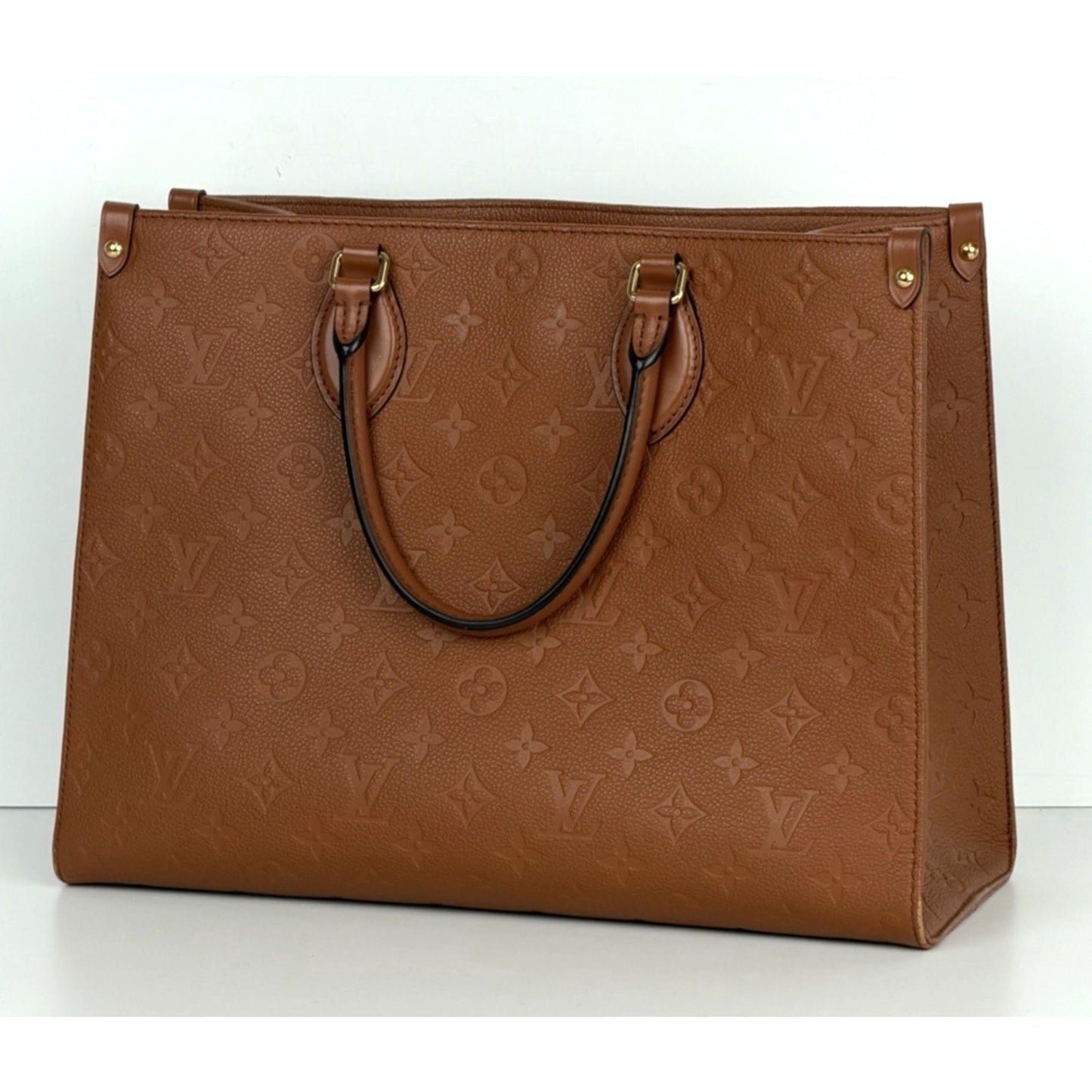Louis Vuitton OnTheGo MM Tote Bag in Cognac Monogram Empreinte Leather D9
