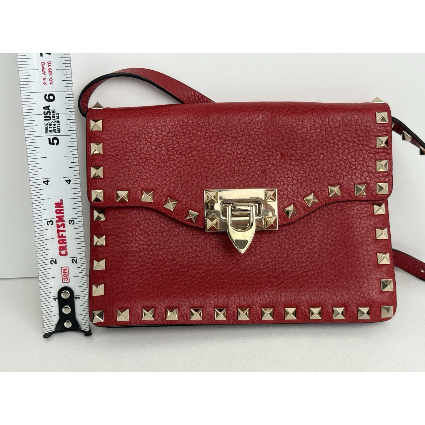 VALENTINO GARAVANI Pebbled Calfskin Medium Rockstud Rouge Pur