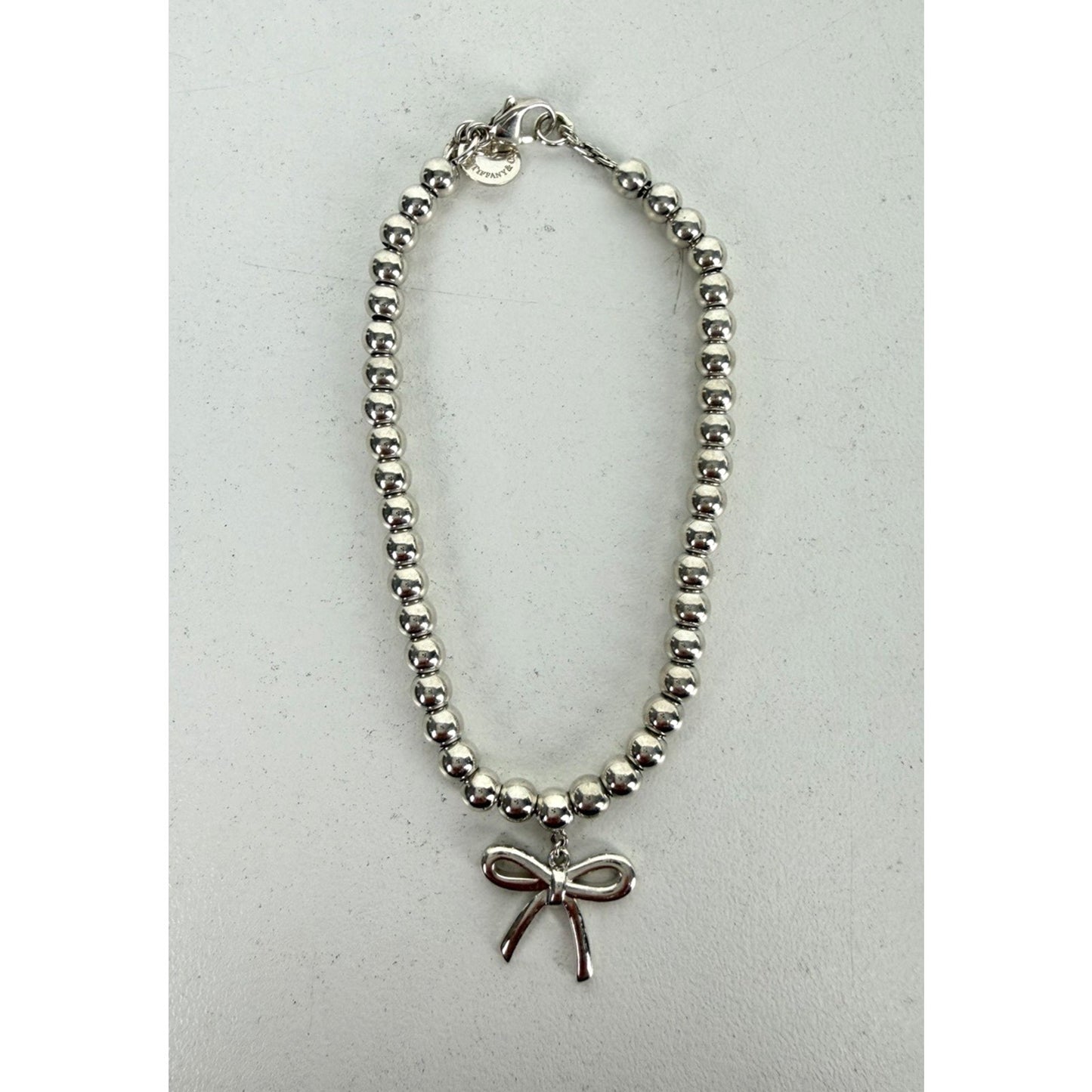 Tiffany & Co. Sterling Silver Bow Charm Beaded Bracelet