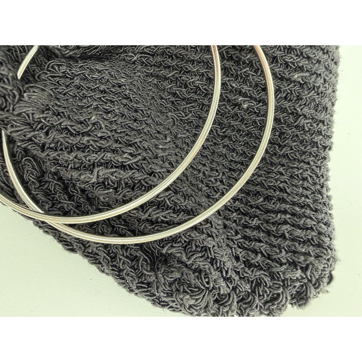 The Row Flat Micro Circle Bag in Black S08