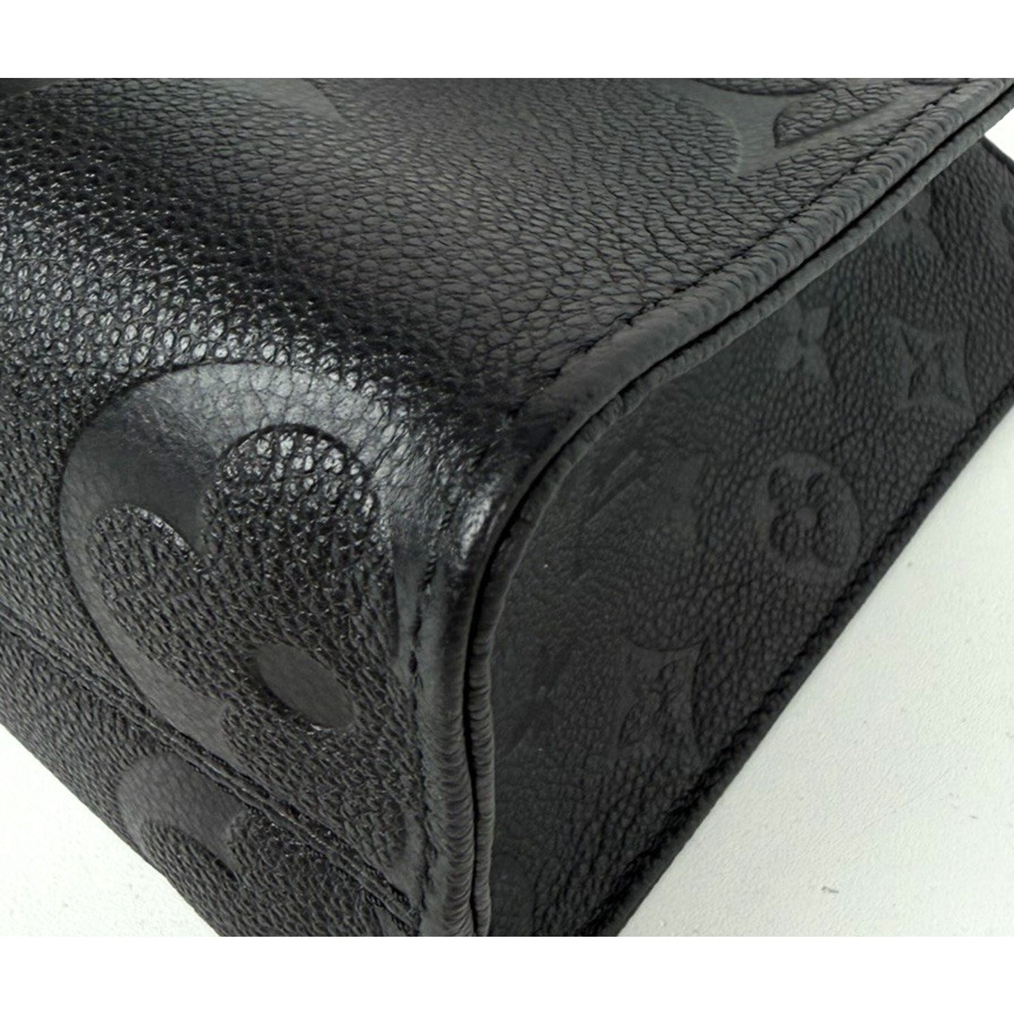 Louis Vuitton OnTheGo PM Bag in Black Embossed Monogram Empreinte Leather NFC E1