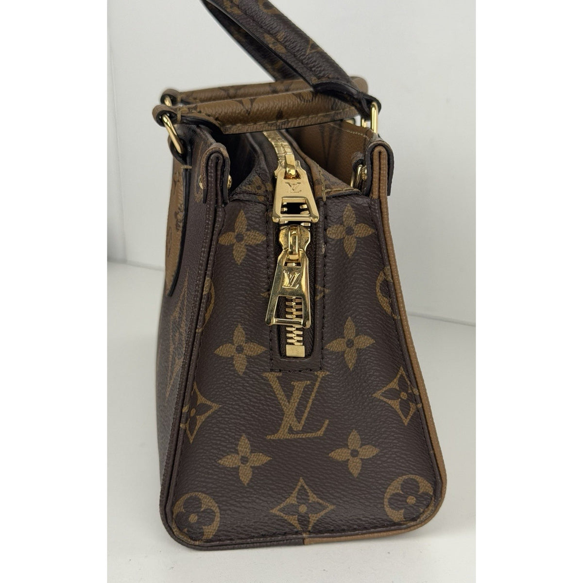 Louis Vuitton OnTheGo East West HandBag Monogram Reverse Brown Canvas NFC E2
