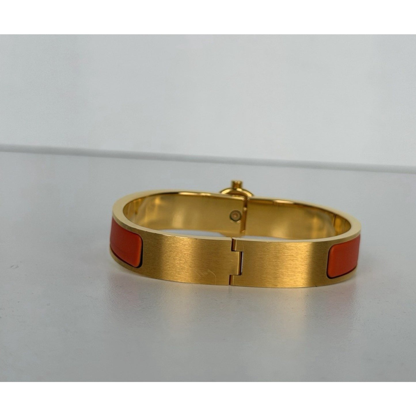 Hermes Clic H Bracelet in Orange Enamel