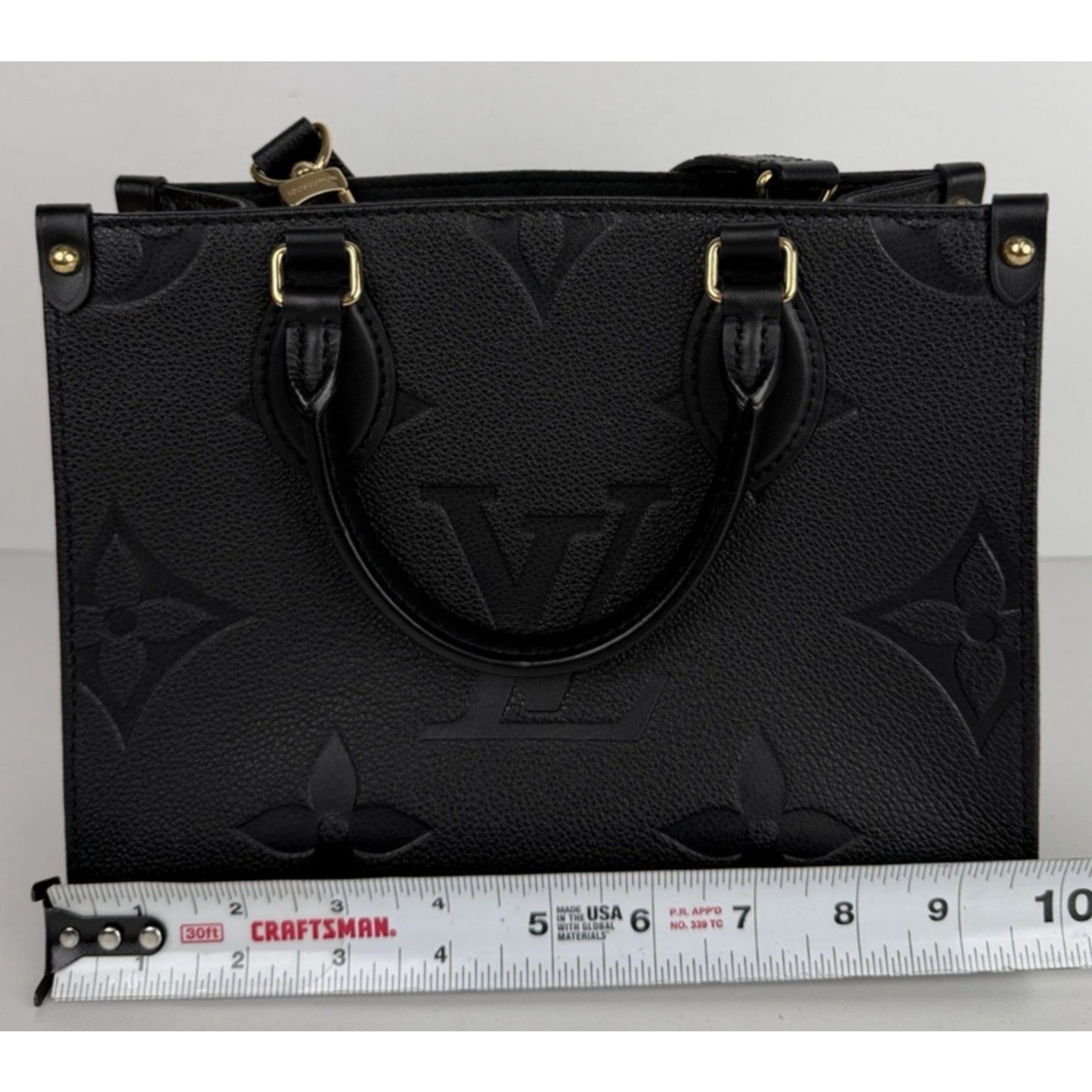 Louis Vuitton OnTheGo PM Bag in Black Embossed Monogram Empreinte Leather NFC E1