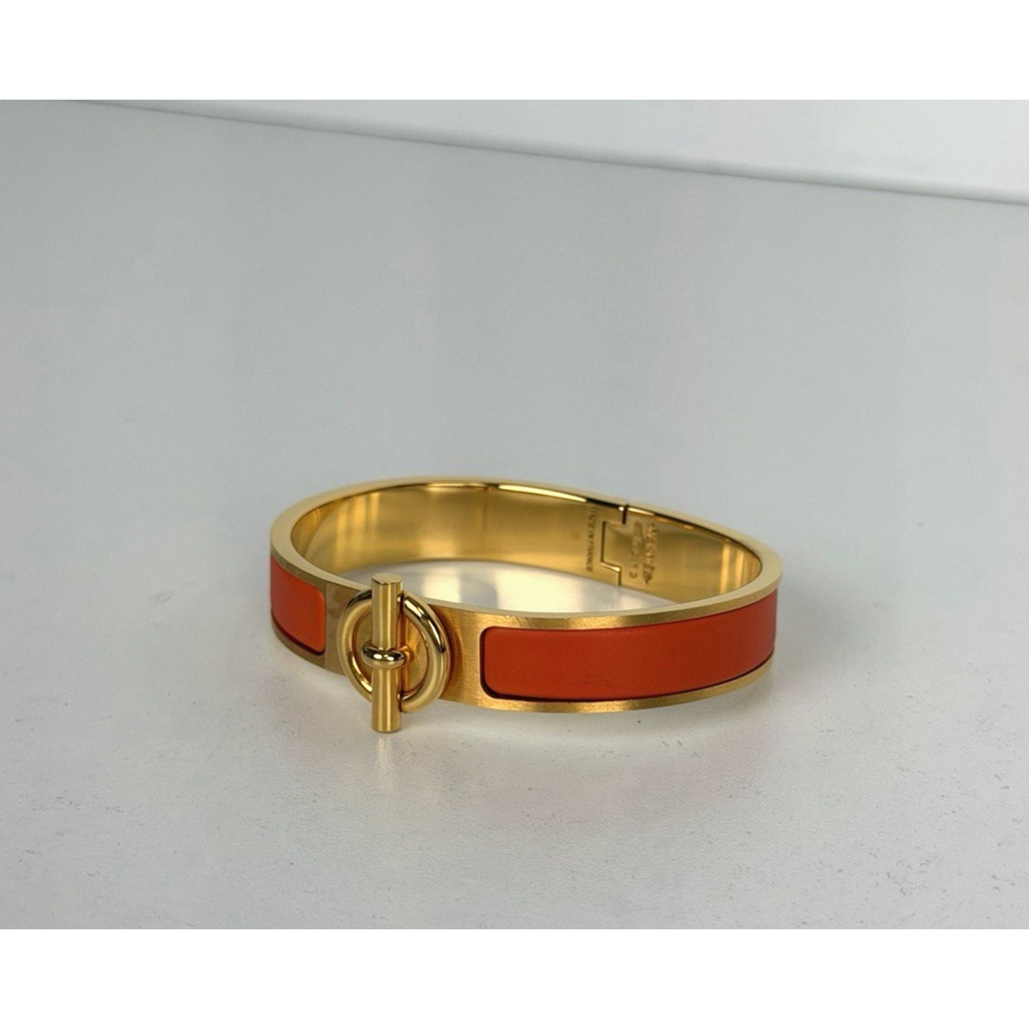 Hermes Clic H Bracelet in Orange Enamel