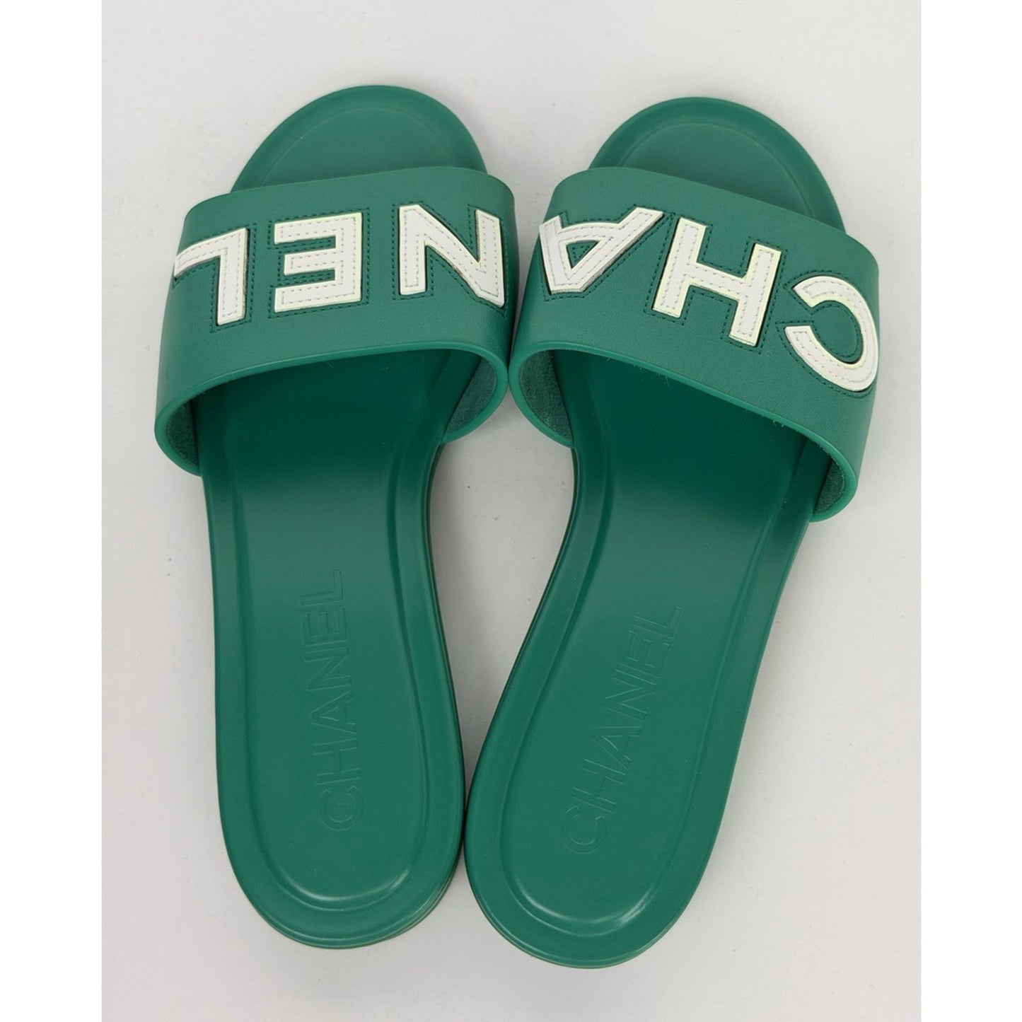 Chanel Mules in Emerald Green Leather with Logo Lettering 36 EU (5.5-6 US)