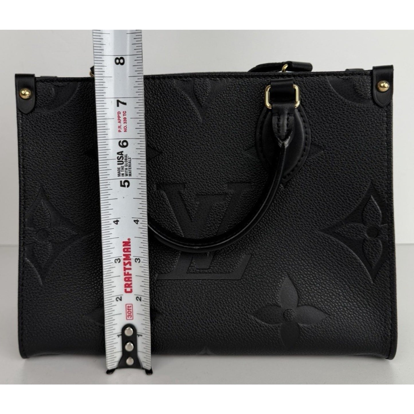 Louis Vuitton OnTheGo PM Bag in Black Embossed Monogram Empreinte Leather NFC E1