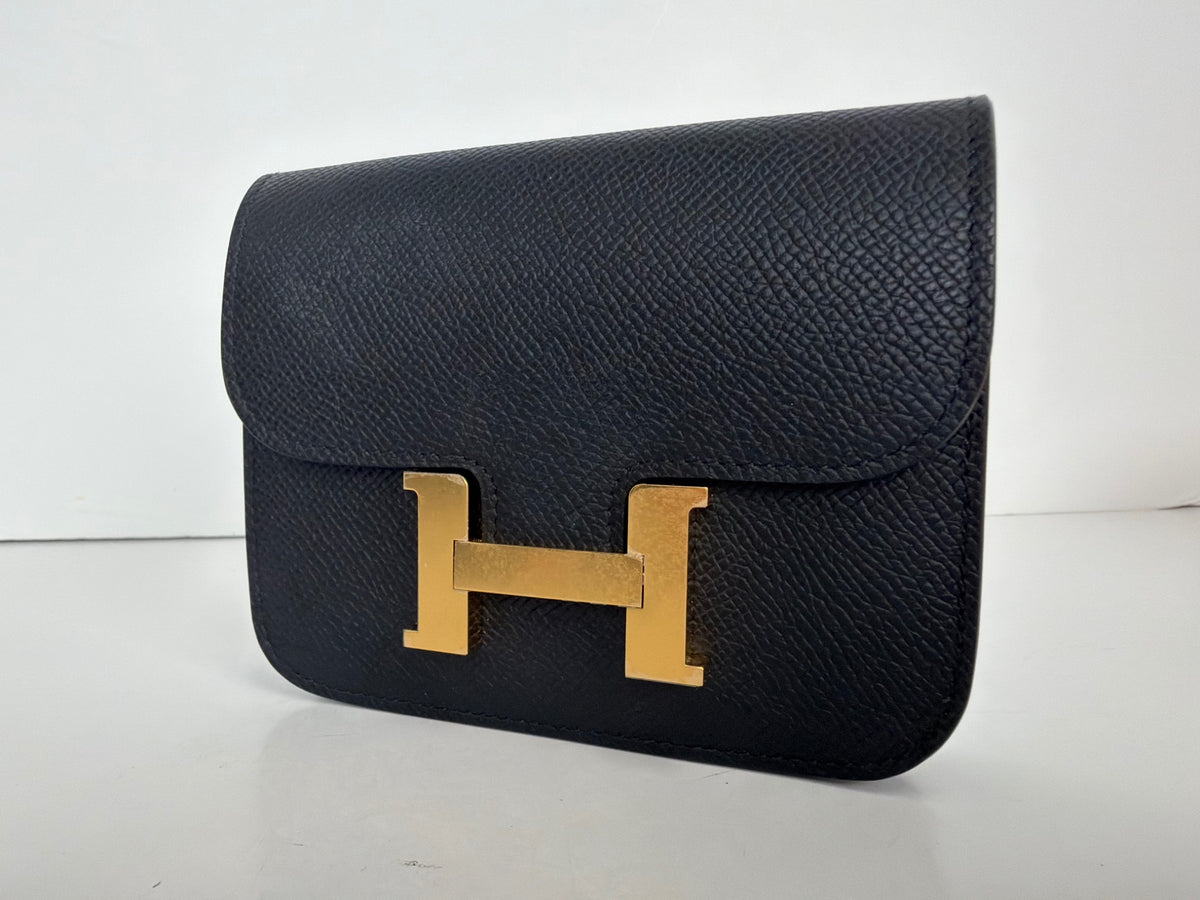 Hermès Constance Slim wallet in Noir Epsom leather with gold hardware